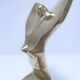 Gilded bronze and sculptural wood paperweight