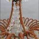 Antique chandelier with pendant decorations, late 19th century.