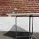 Folding table with chrome and pink formica.