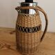 Thermos en rotin vintage