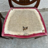Set of 6 wooden chairs sitting red