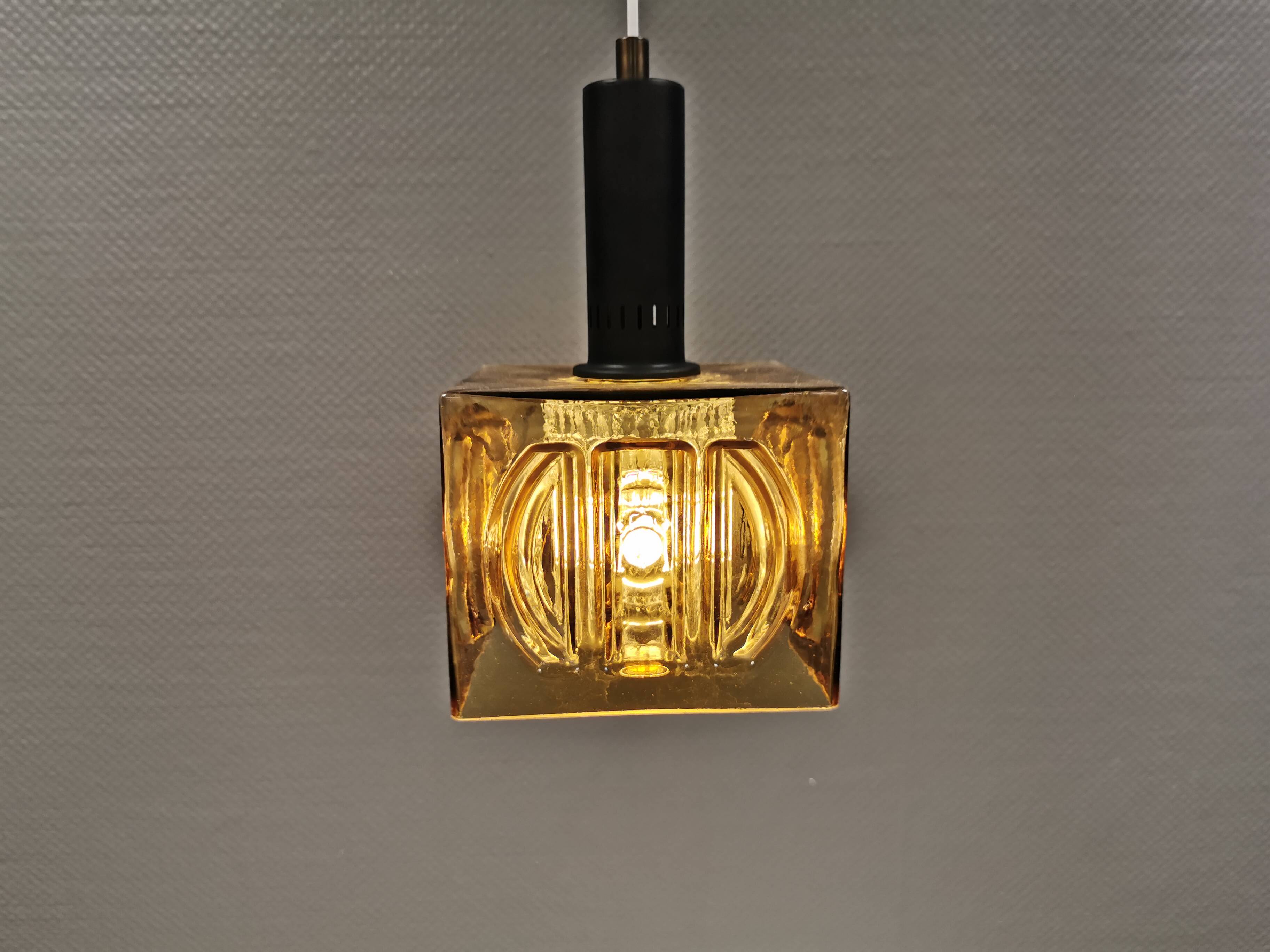 Older square hanging lamp with olive colored outer glass with inner shade of crystal glass