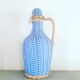 Bottle of wicker and scoubidou yarn from the 60s