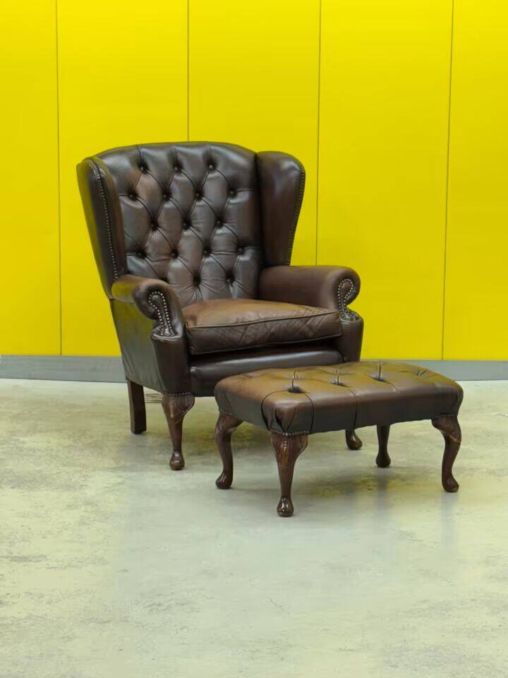 Dark Brown leather chesterfield wing chair with Ottoman