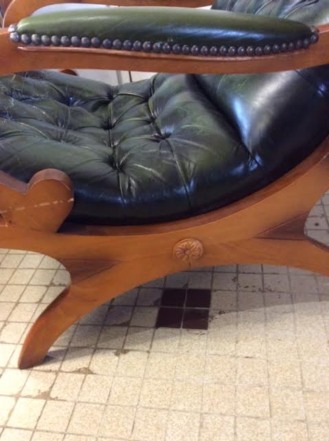 Green Chesterfield armchair