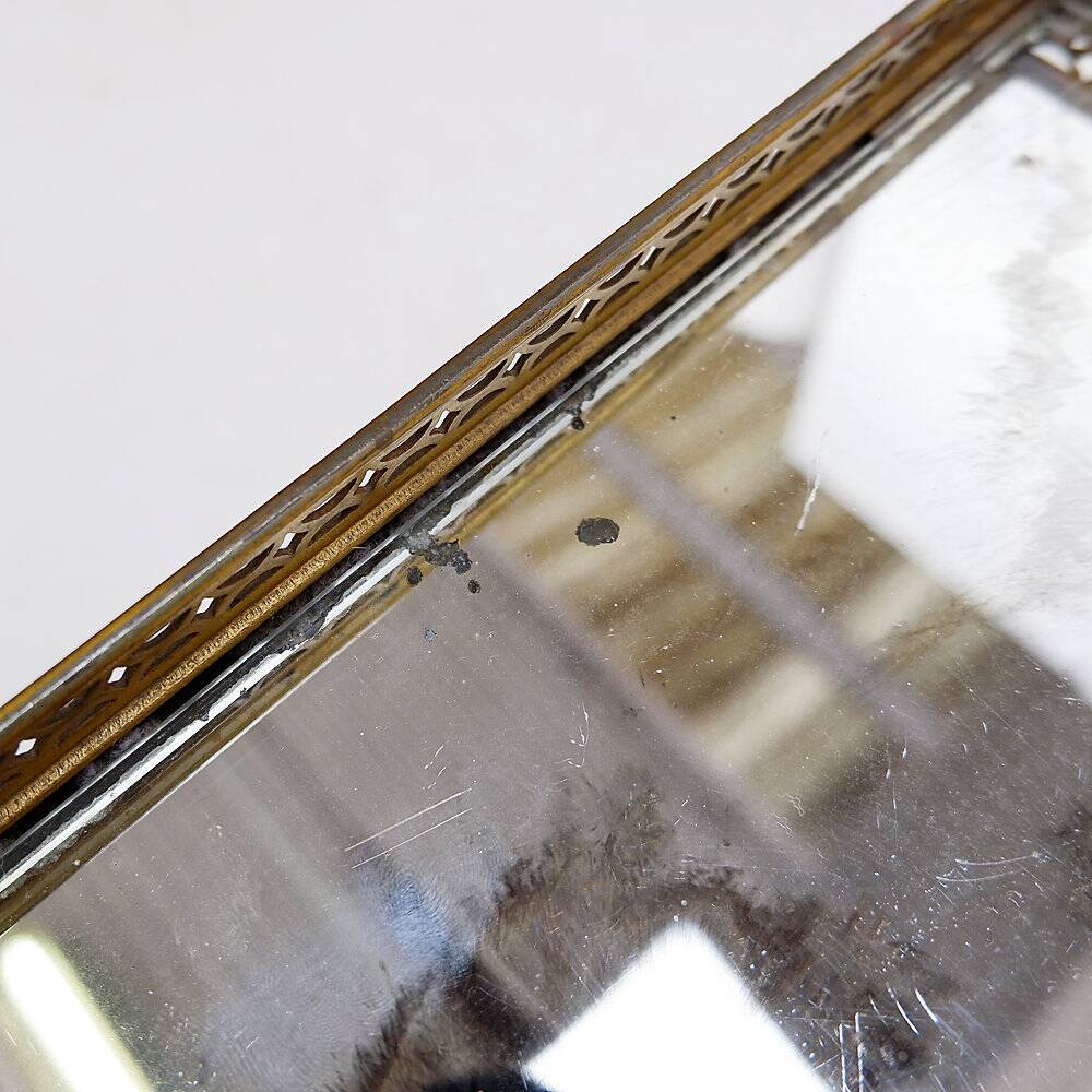 Two-tier side table with eglomisé mirror by Maison Jansen, French.