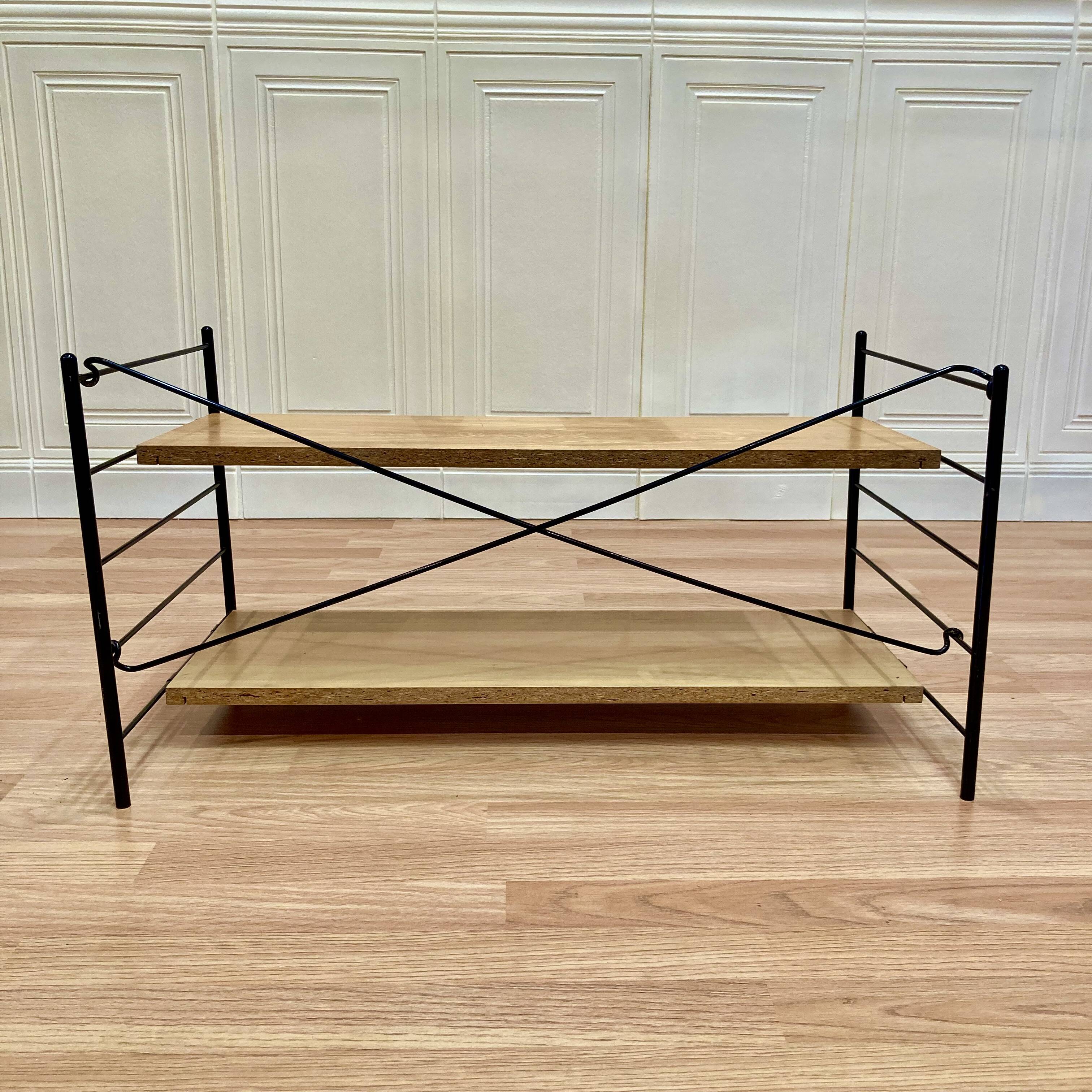 Modular metal and wood shelf design from the 1960s.