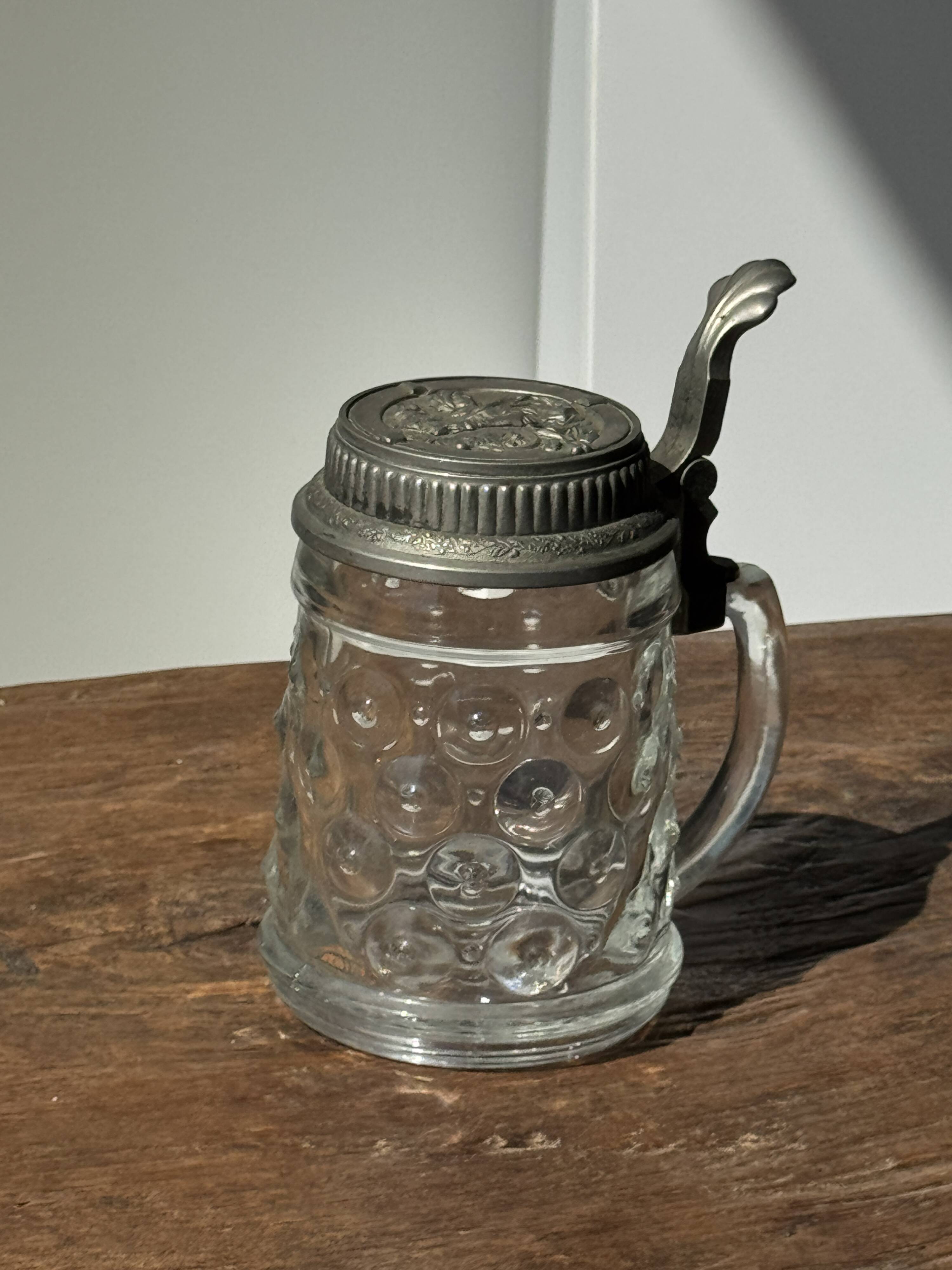Alsatian beer mug with figurative pewter lid