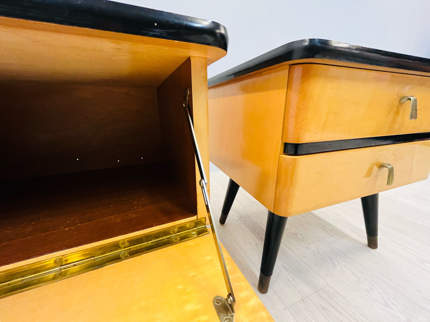 A pair of night cabinets