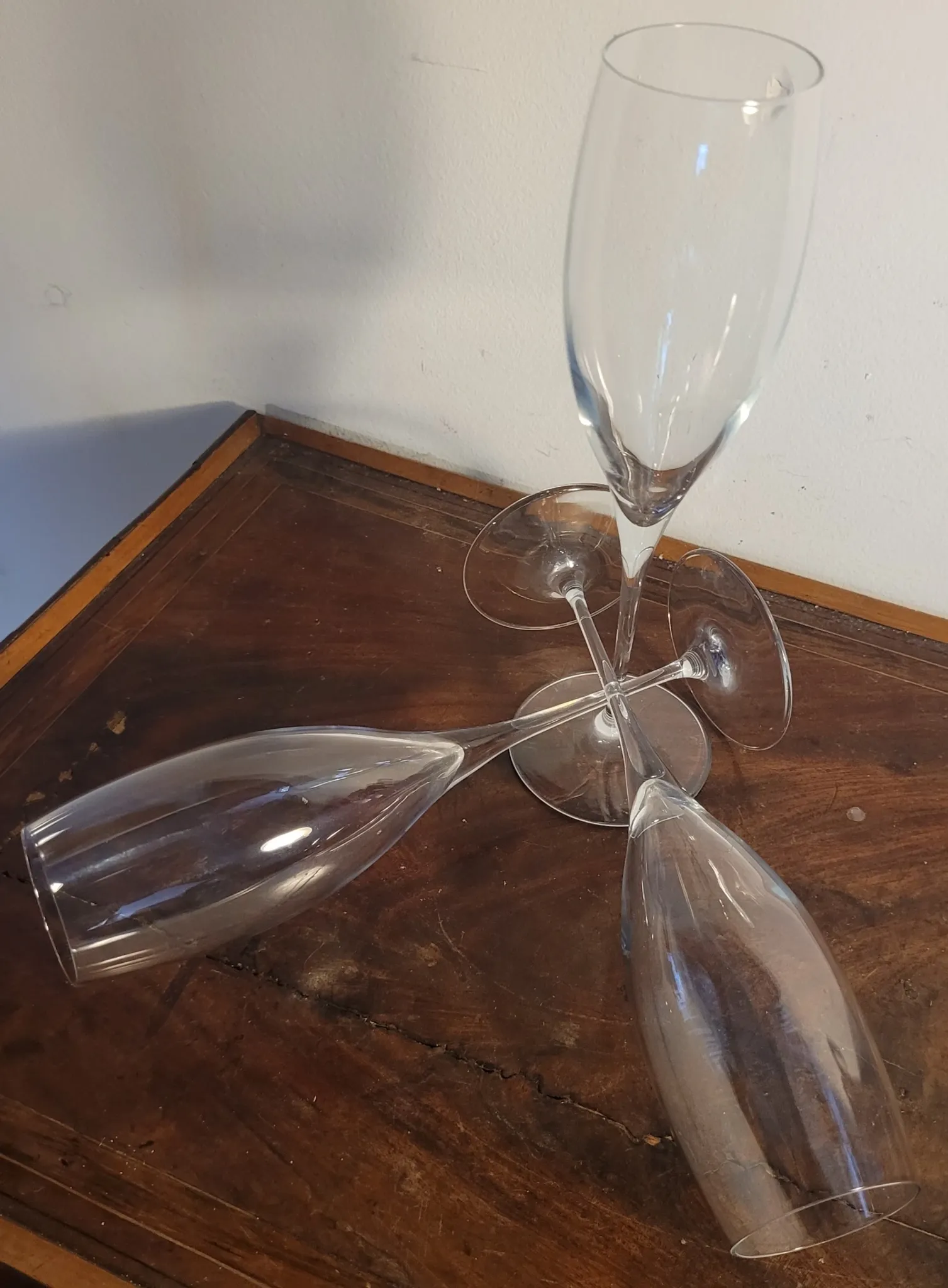 3 large crystal champagne flutes. No brand.