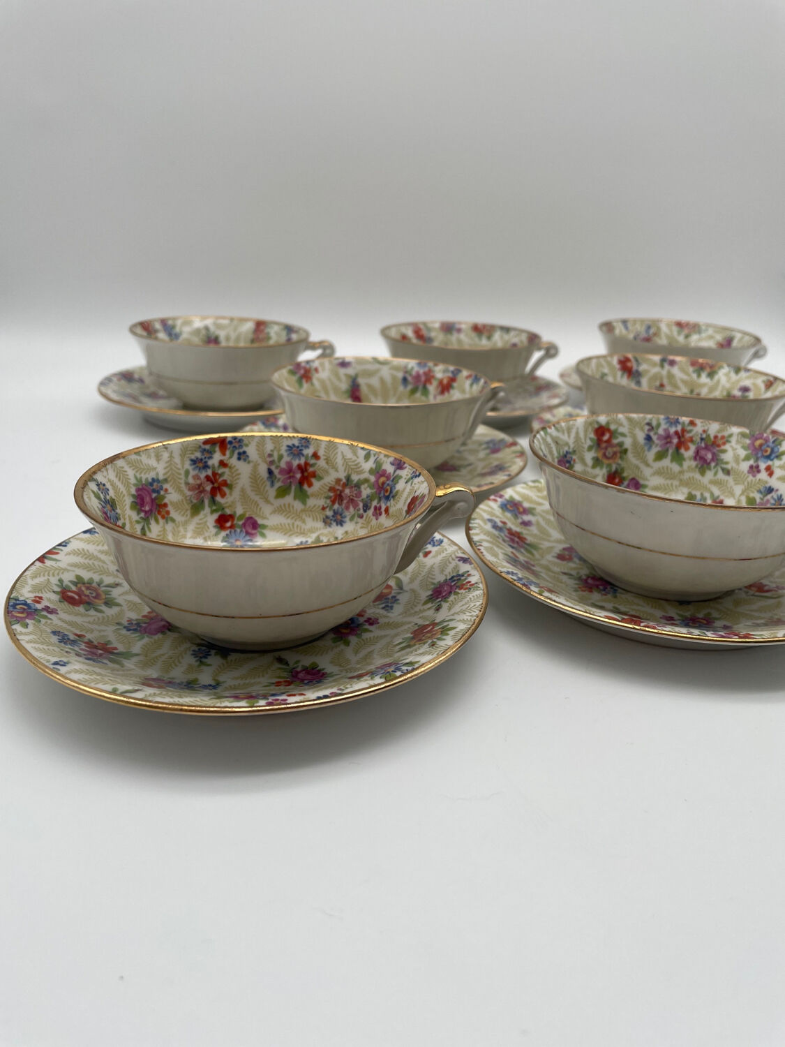 Set of 8 Limoges porcelain coffee cups from France with floral and gold pattern