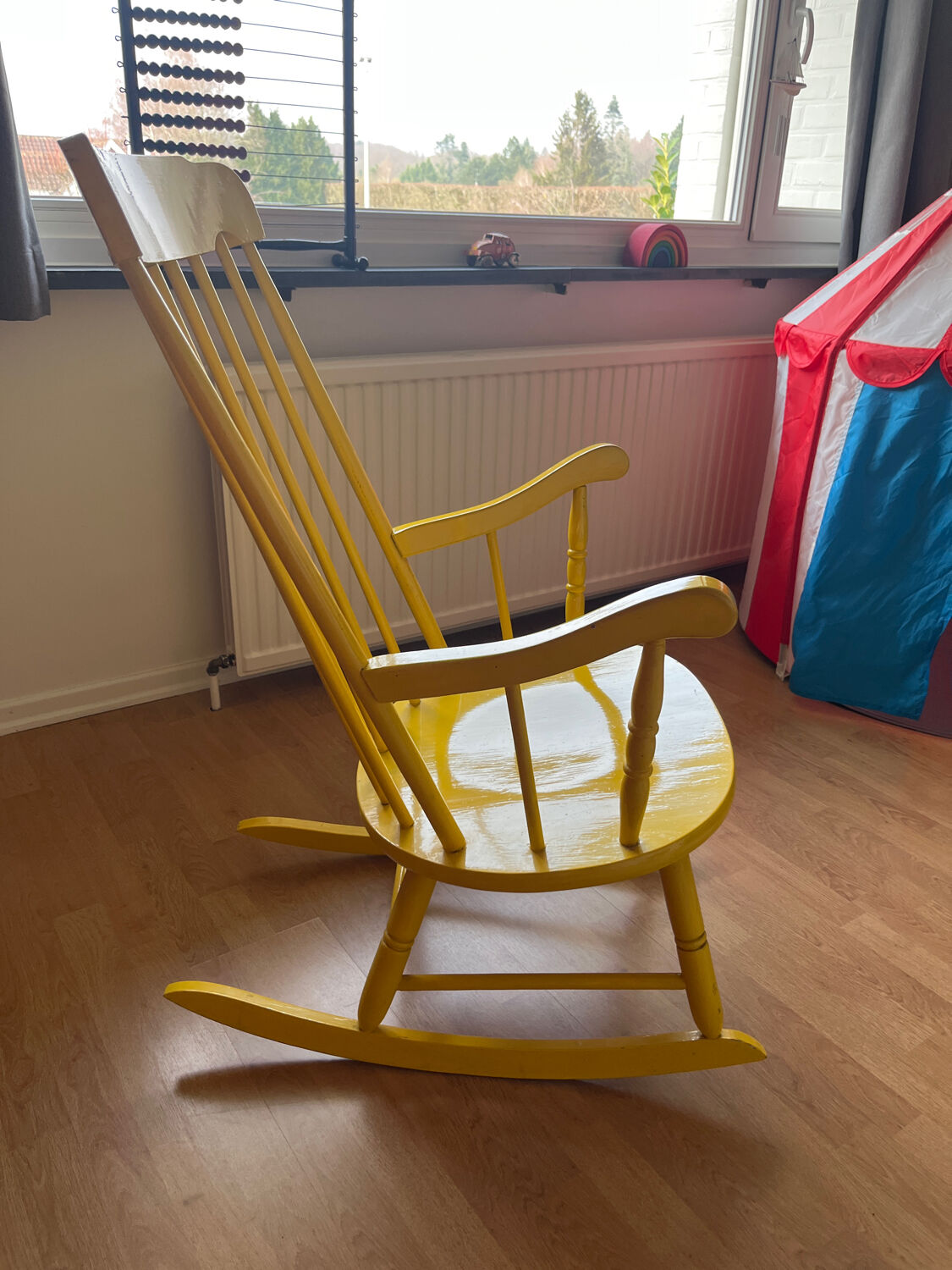 Vintage yellow rocking chair
