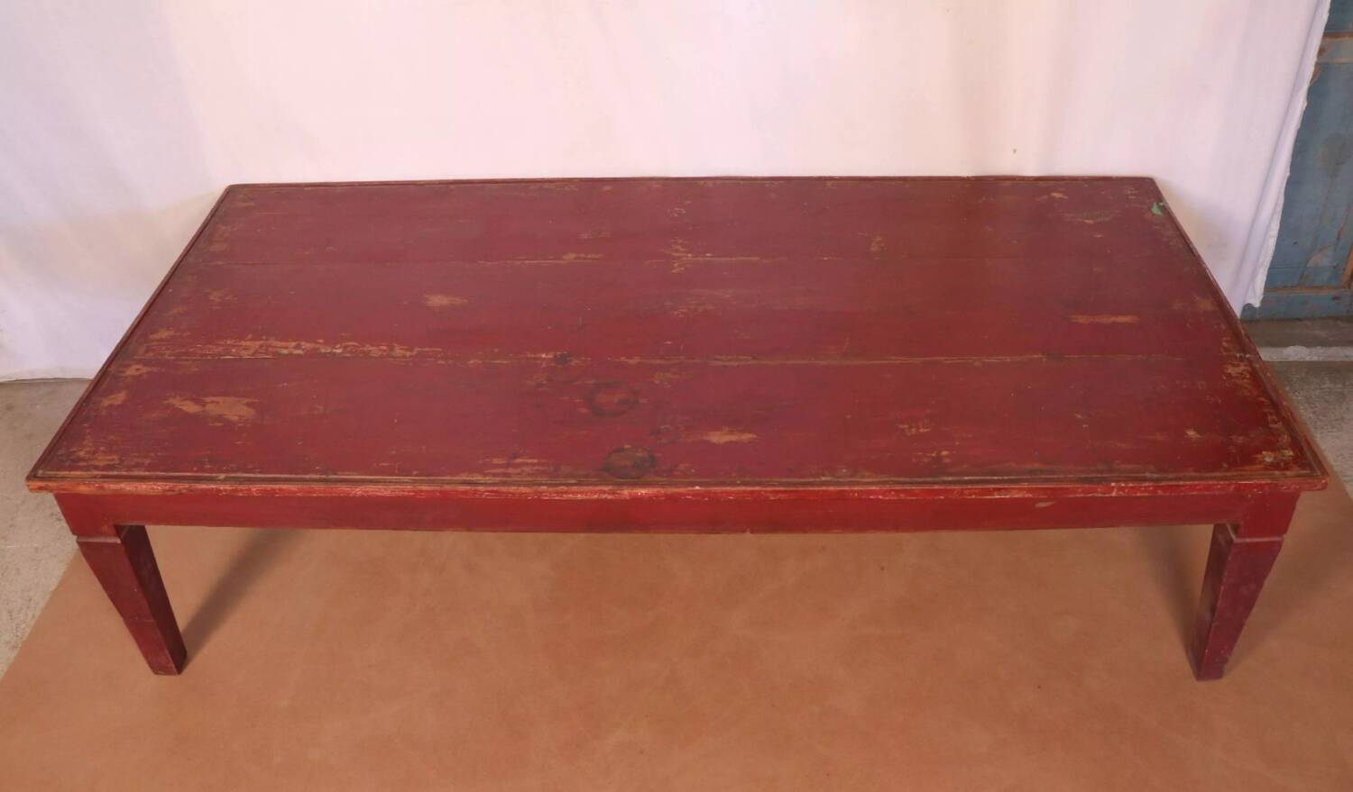 Antique Burmese teak coffee table with original red patina