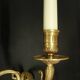 Large pair of wall sconces with male faces in Louis XVI style - bronze