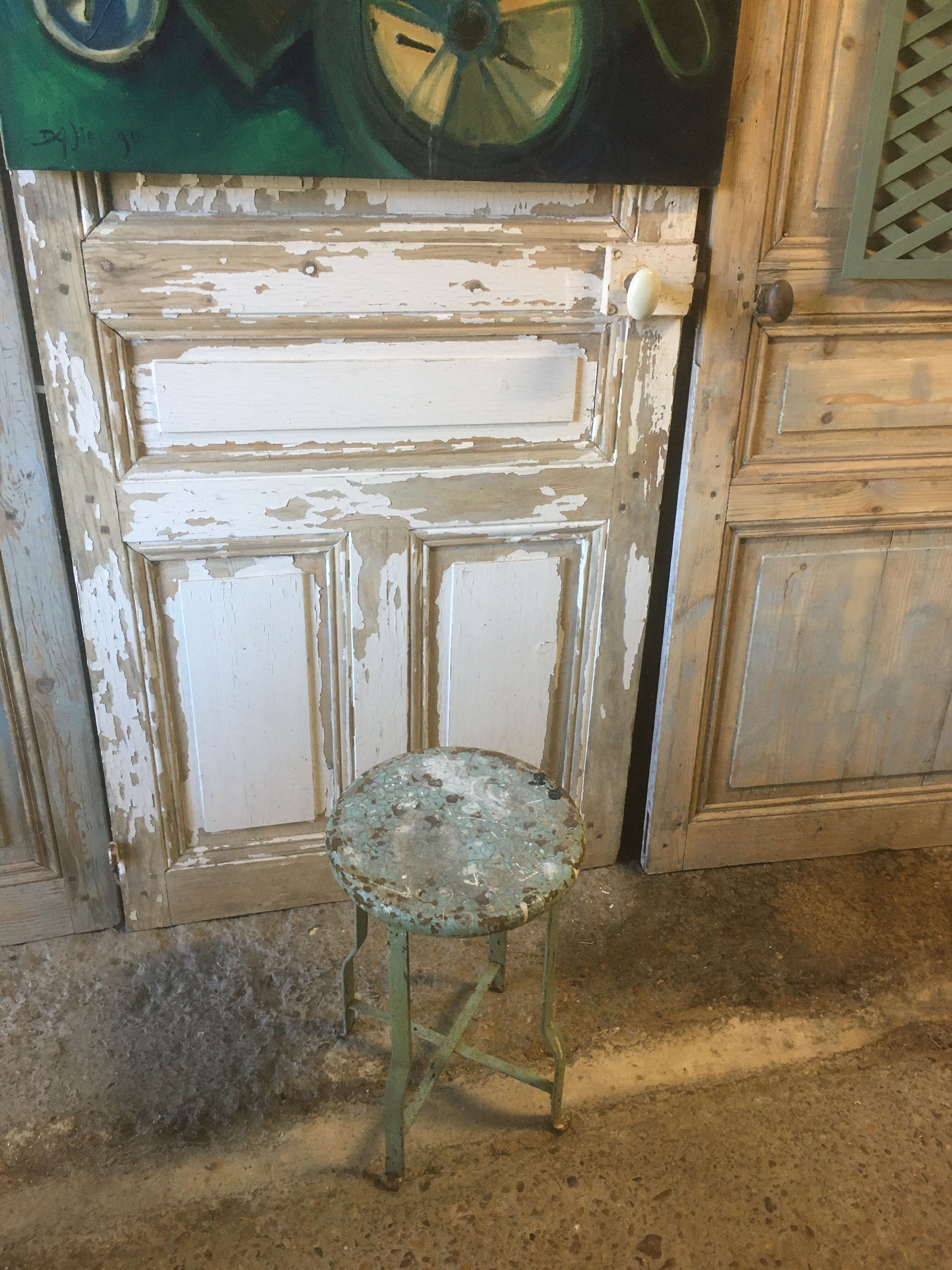 Patinated metal industrial stool
