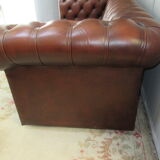 Brown leather chesterfield sofa