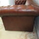 Brown leather chesterfield sofa