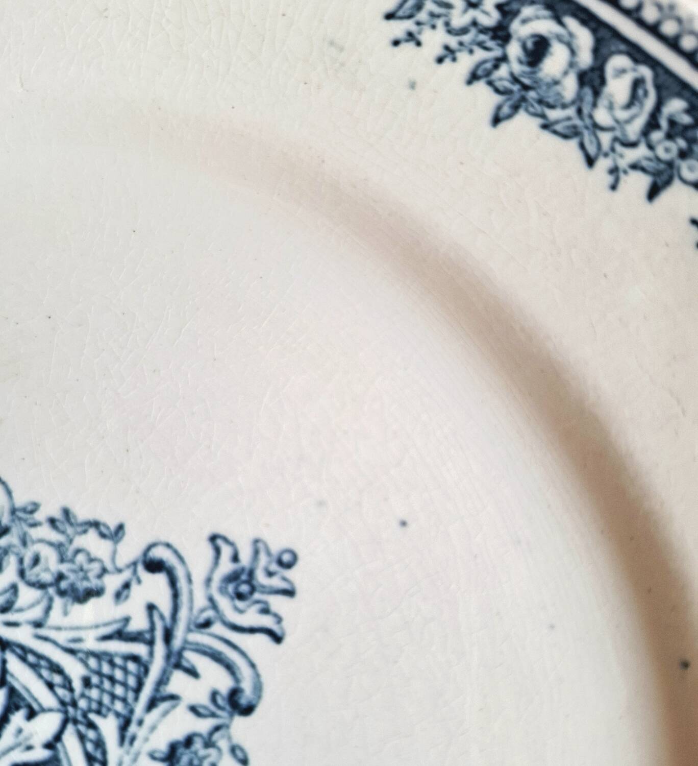 Antique earthenware dessert plates accompanied by a dish