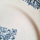 Antique earthenware dessert plates accompanied by a dish