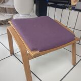 Relaxing armchair and its Scandinavian footrest