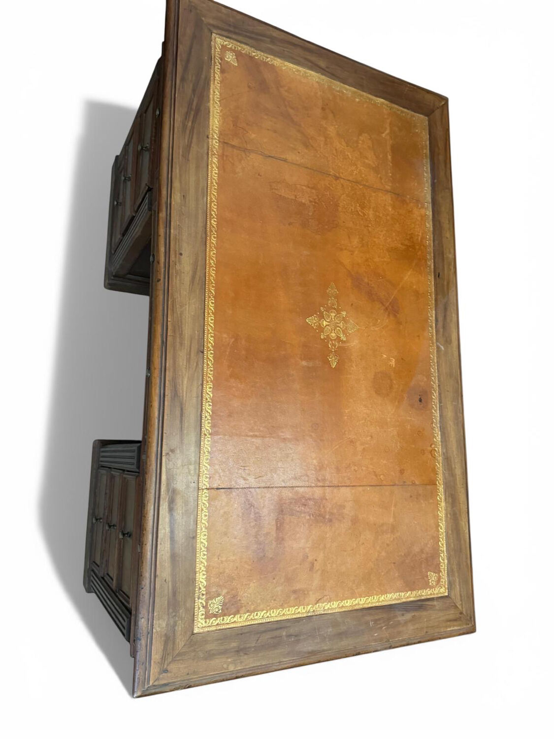 Oak desk with 9 drawers and leather writing pad.