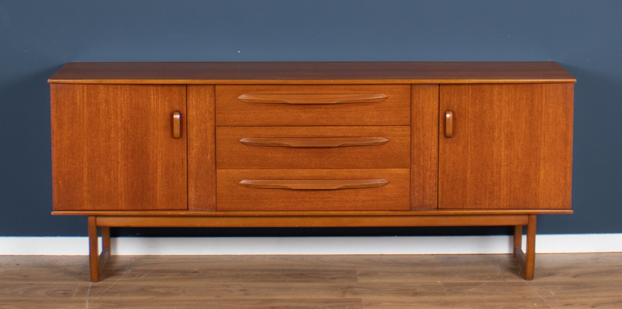 Teak 1960s sideboard with sleigh legs