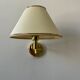Vintage adjustable wall lamp, brass and beige fabric, France 1970