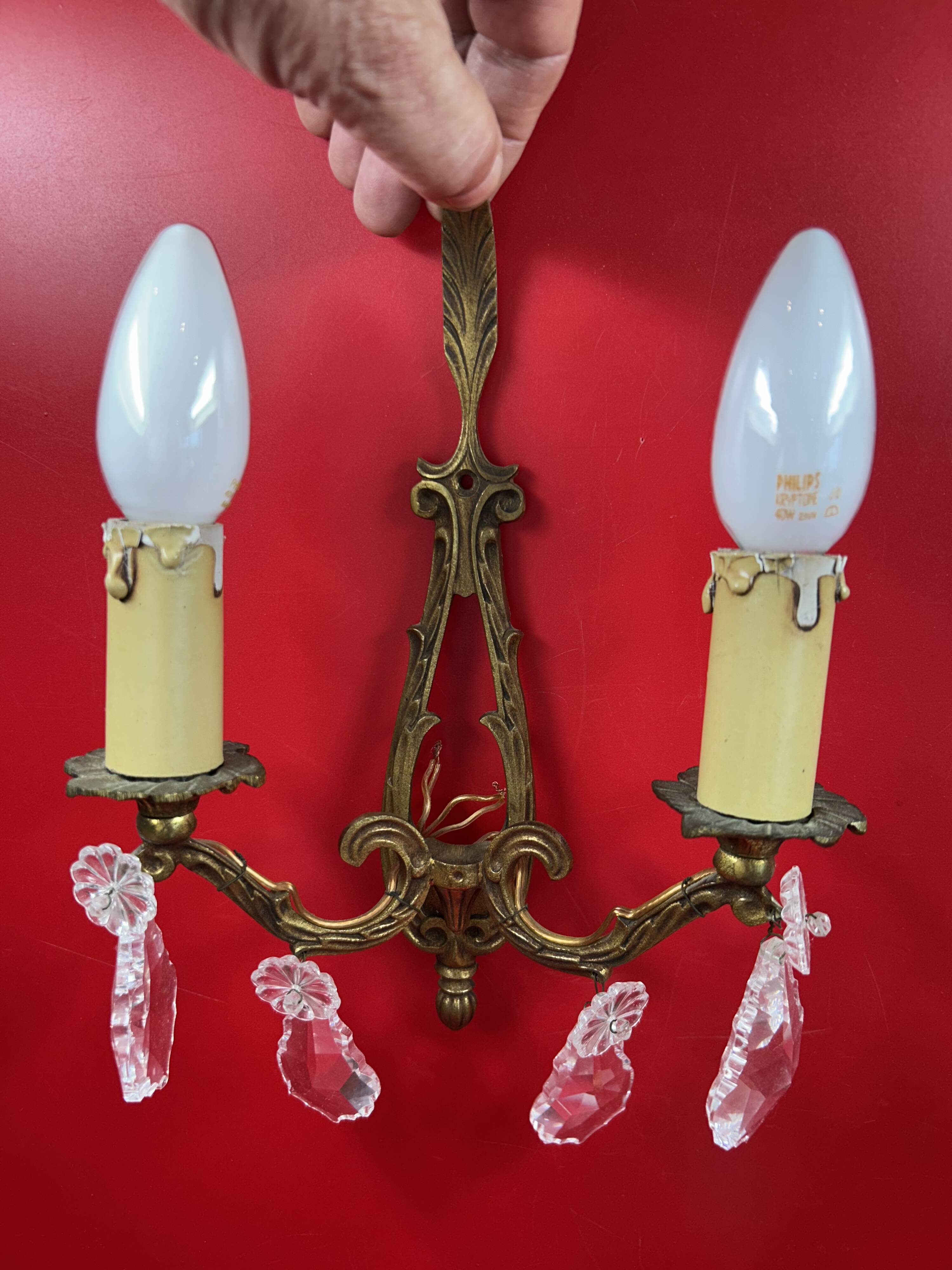 Pair of Louis XVI style wall lights, gilded bronze