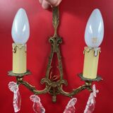 Pair of Louis XVI style wall lights, gilded bronze