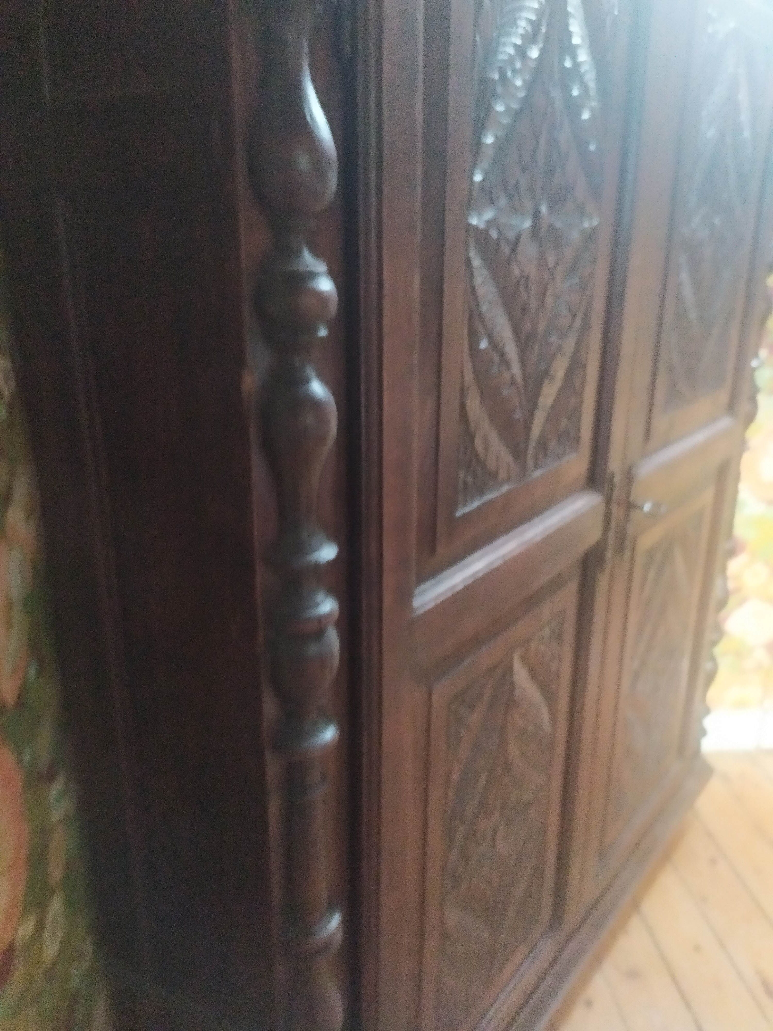 Old cabinet door carved solid oak