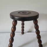 Brutalist stool with turned wooden legs