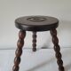 Brutalist stool with turned wooden legs