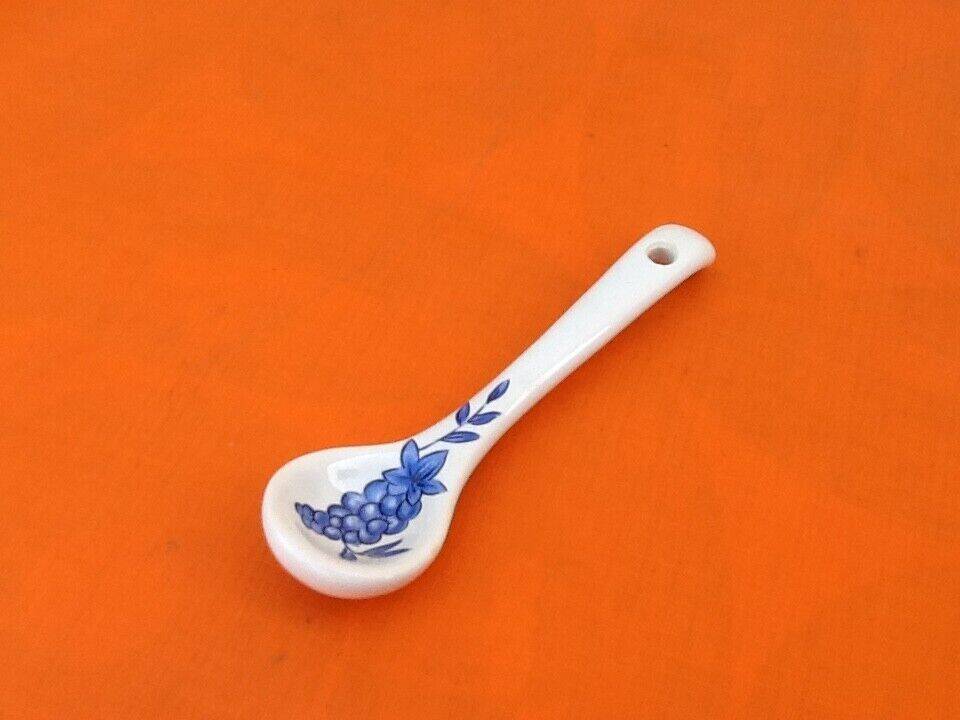 White porcelain gravy boat, fruit basket decor