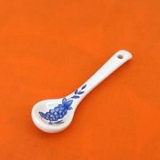 White porcelain gravy boat, fruit basket decor