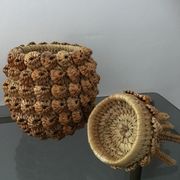 Trash in the form of the pineapple in natural fibers