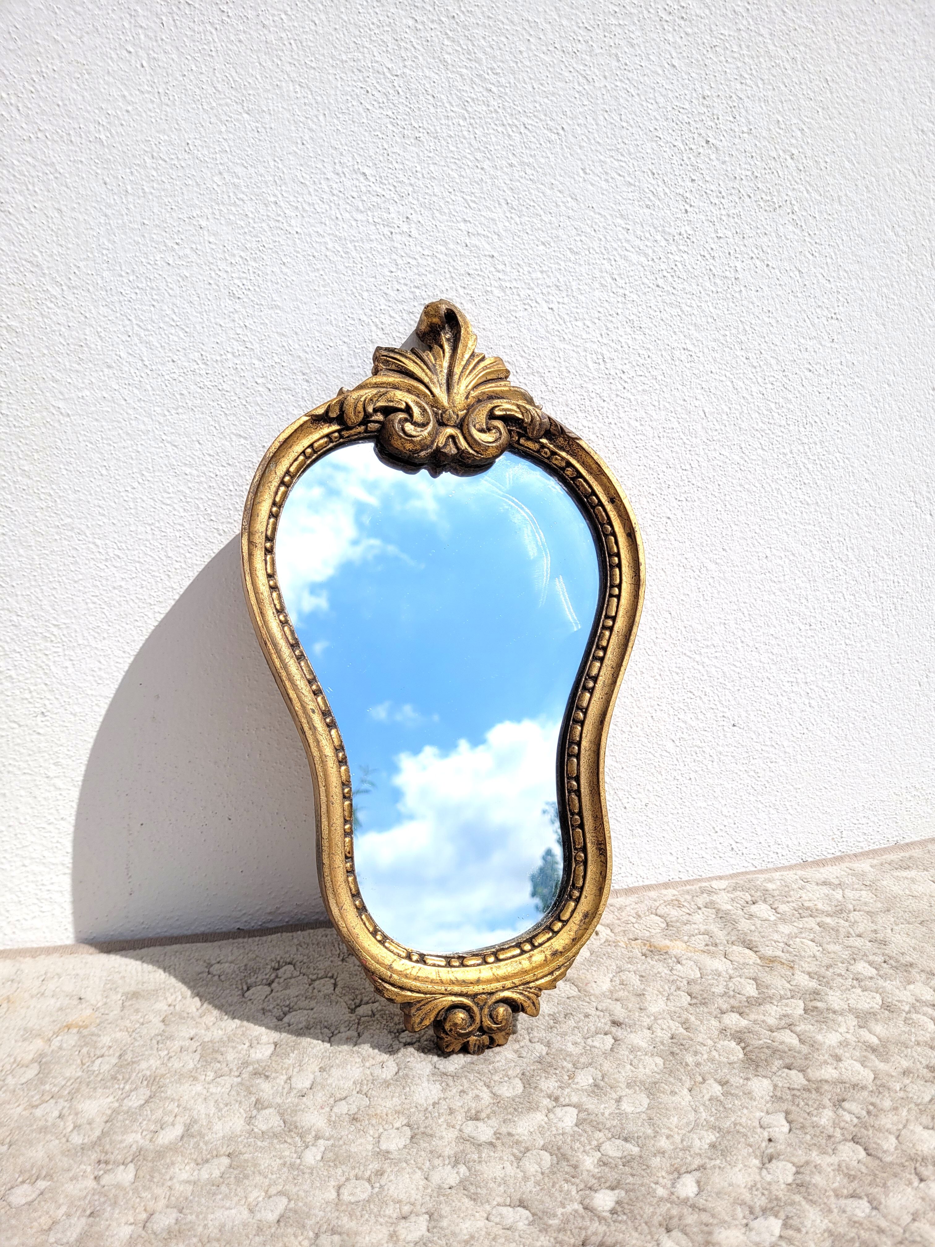 Small gilded mirror with pediment 1960