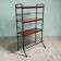 Vintage black shelf/coat rack with wooden accents.