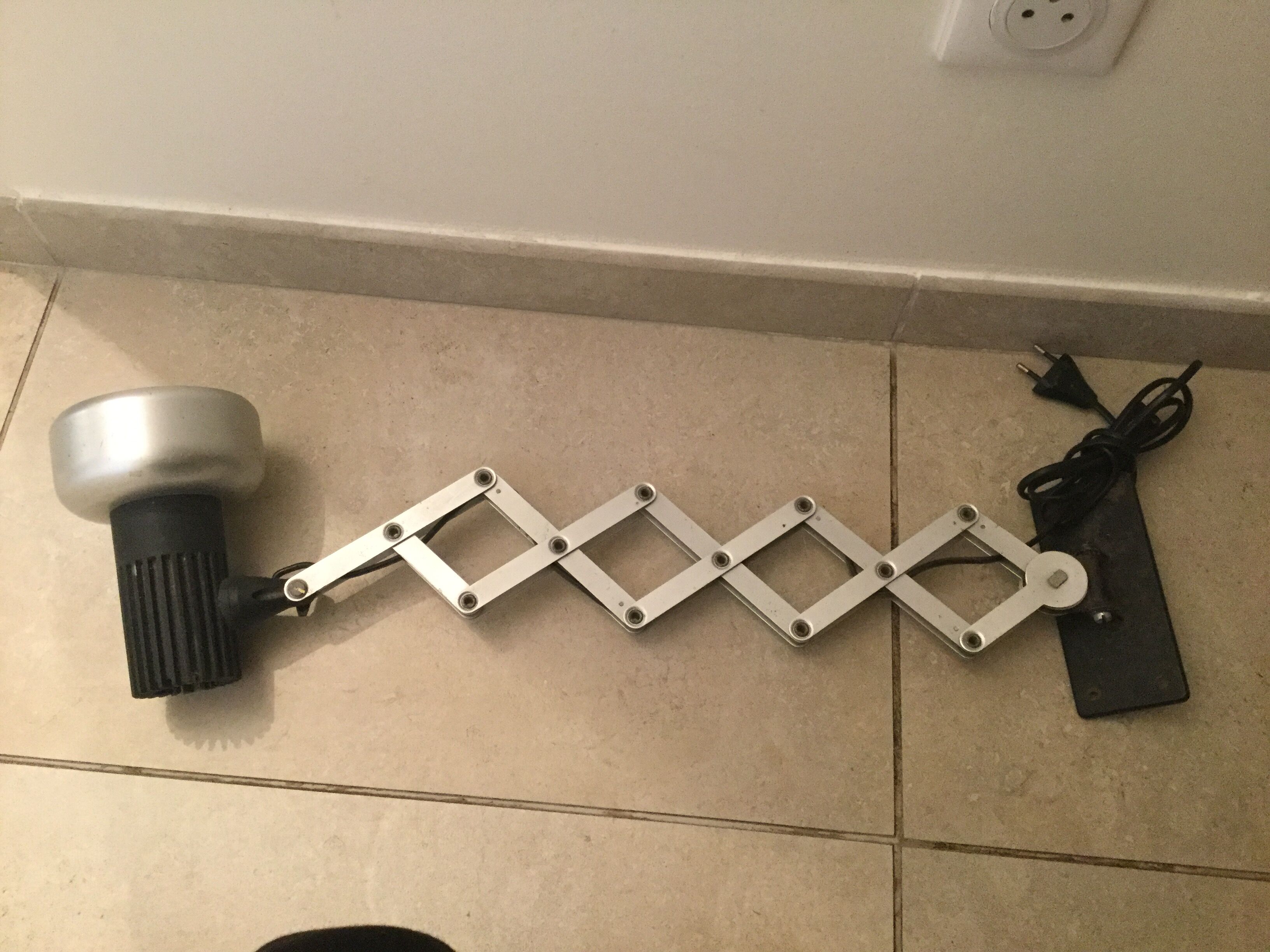 Industrial accordion wall light