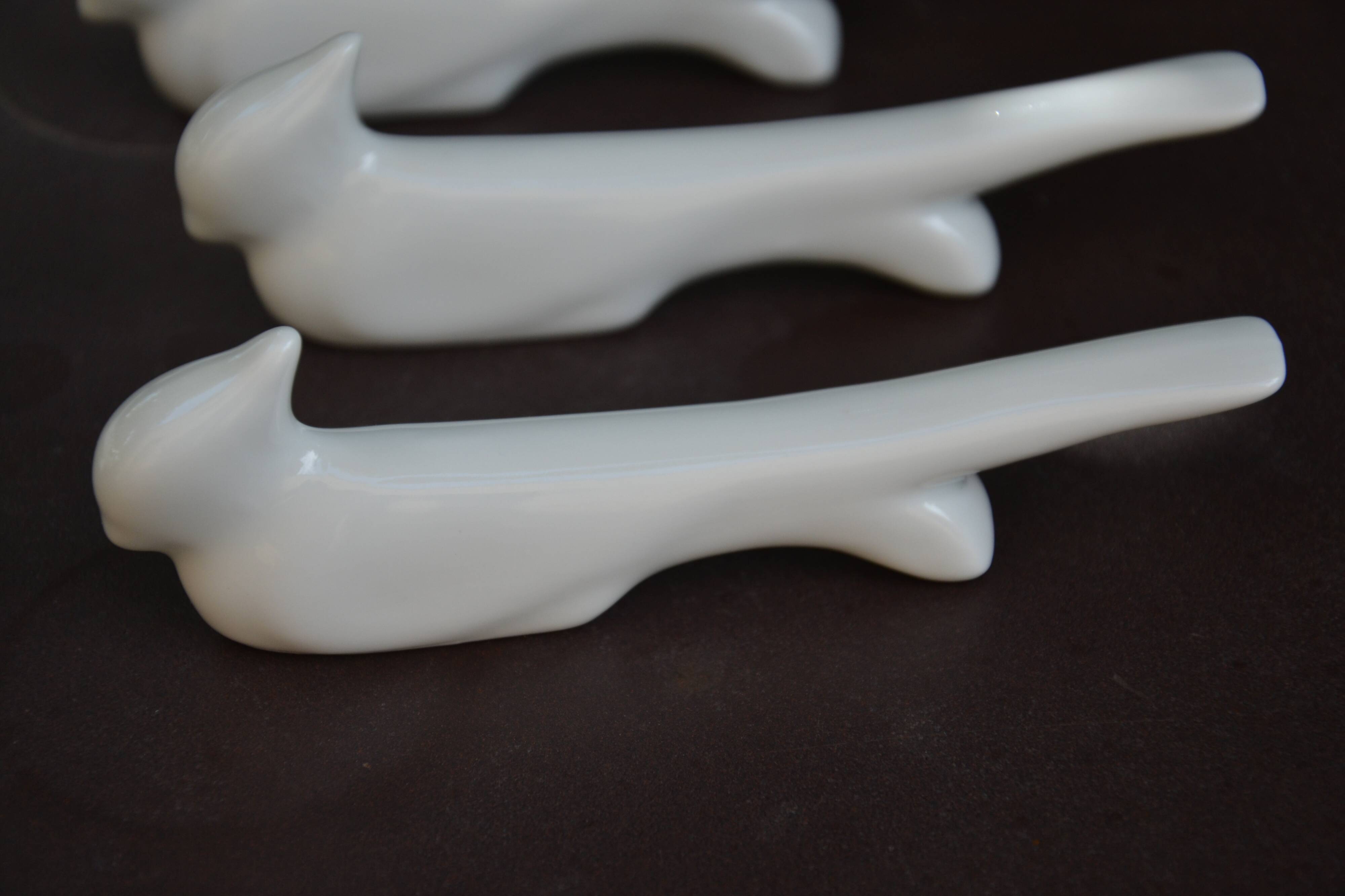 10 ceramic "bird" knife rests
