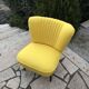 Yellow cocktail chair in solid beech, 1960s, with fluted backrest and tapered legs.