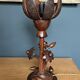 Art Deco wooden lamp with hand-carved lotus flower.