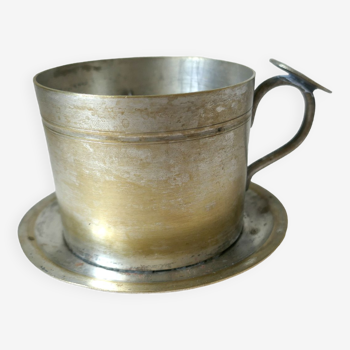Individual coffee maker in silver metal