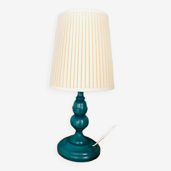 Vintage table lamp with turned wooden base and pleated canvas lampshade