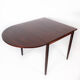Dining table in rosewood with extension plates, designed by Arne Vodder, 1960s
