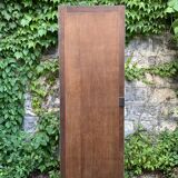 Beveled mirror on turquoise Parisian door
