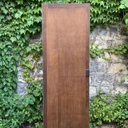 Beveled mirror on turquoise Parisian door