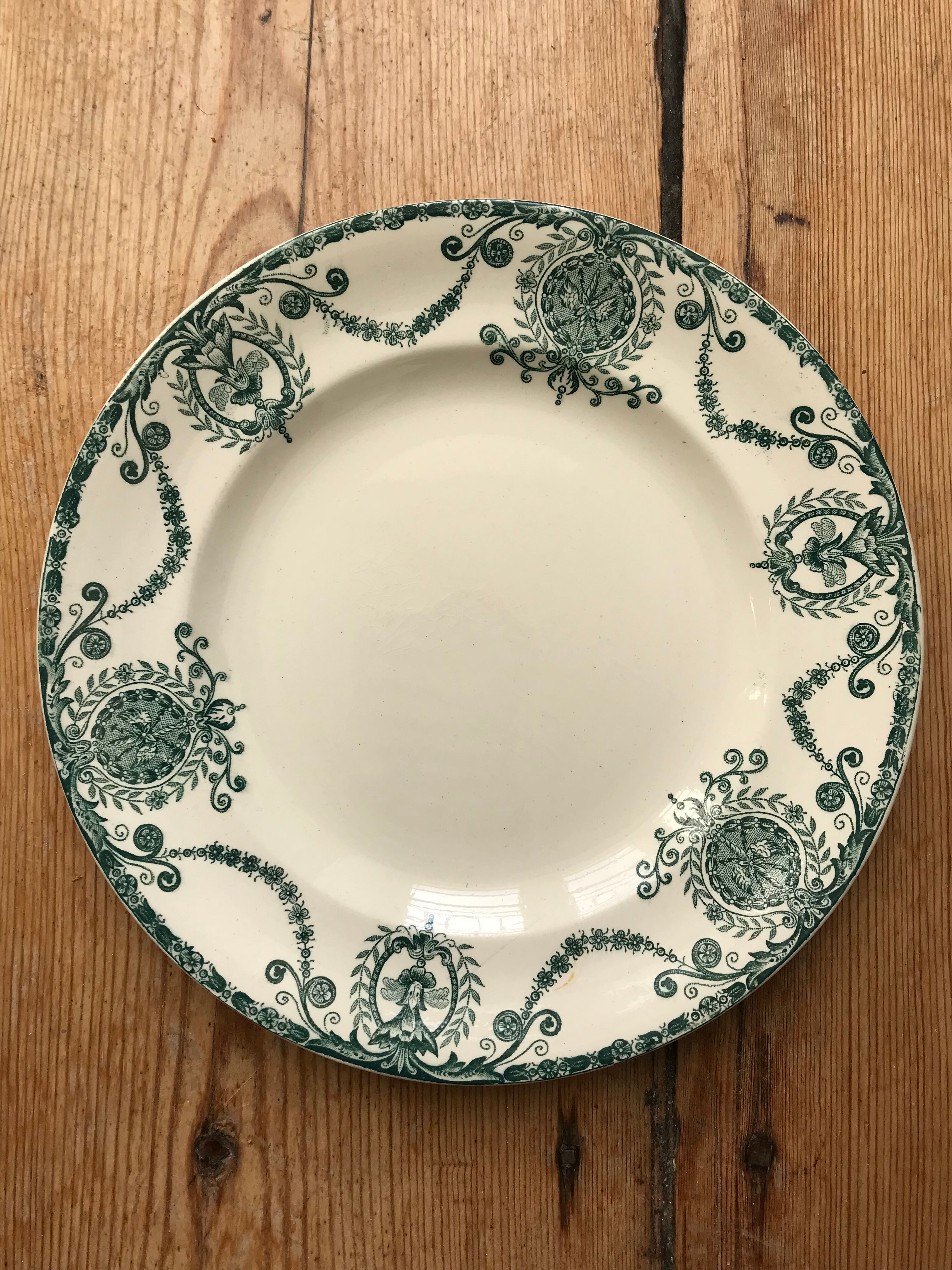 Series of 8 old flat plates Terre de Fer