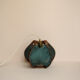 Dark green woven lamp to hang