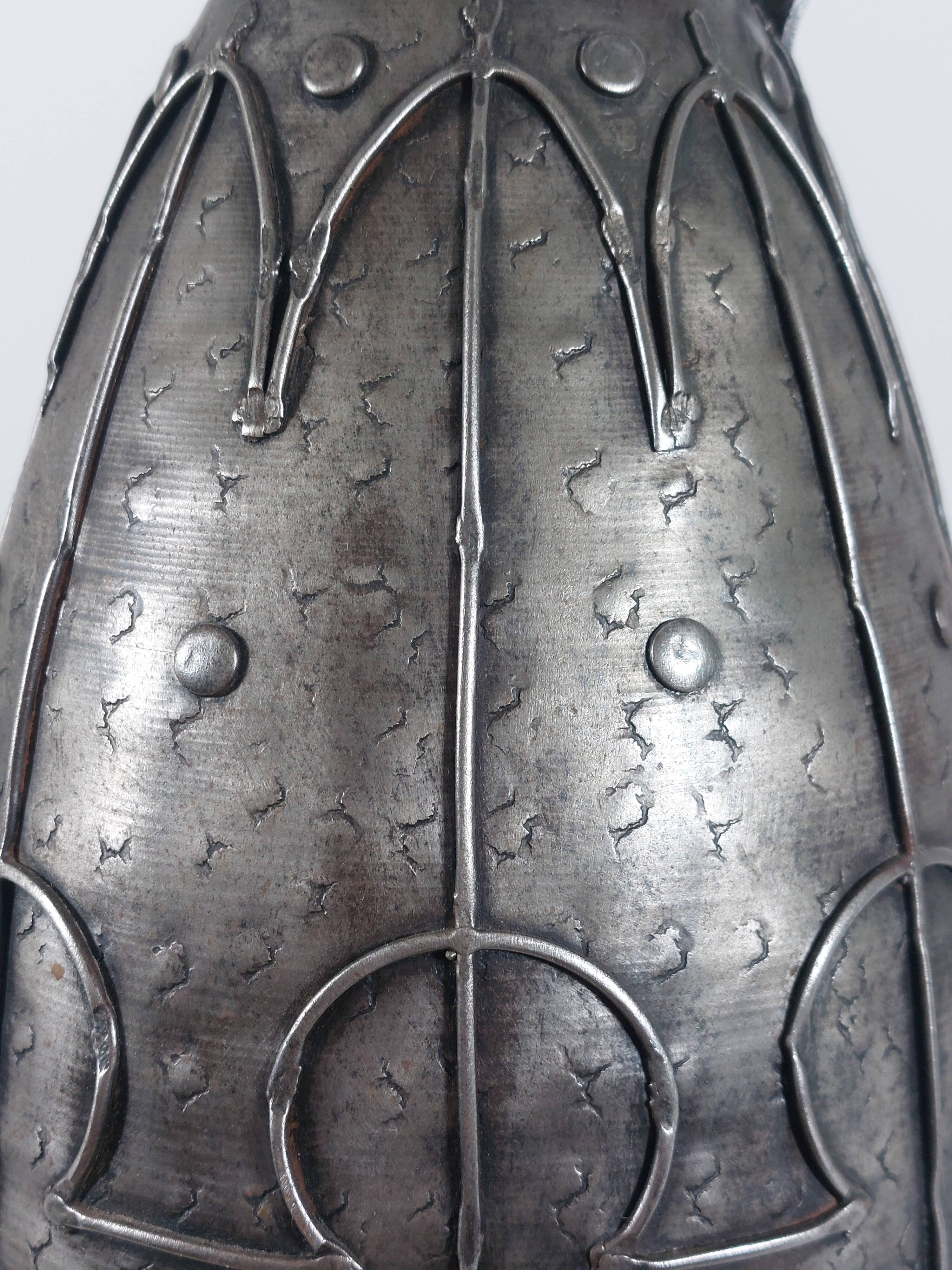 Rare hand-forged metal pitcher and craftsmanship from France.
