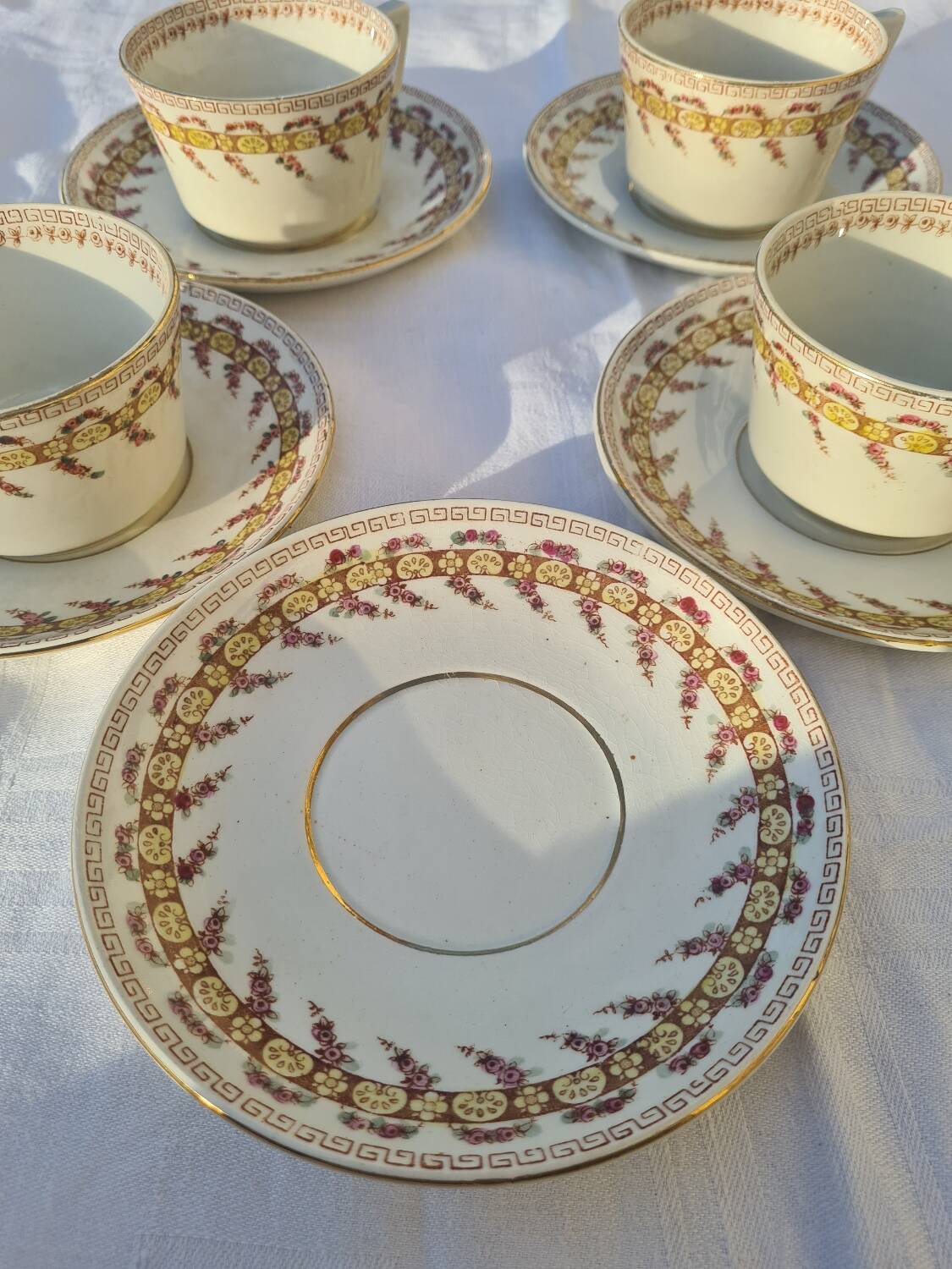 Gien opaque porcelain cups from the early 20th century